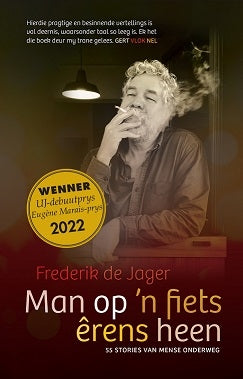 Man op 'n fiets êrens heen